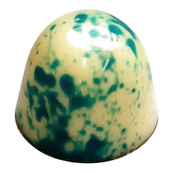 Cocos: lichte ronde bonbon met blauwgroene spikkels