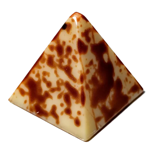 Bailey's: driehoekige lichte bonbon met bruine spikkels