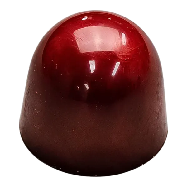 Caramel zeezout: glanzende donkerrode ronde bonbon